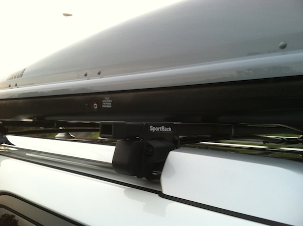 SportRack crossbars w/ Thule Evolution 1600XT cargo carrier. Was a tight fit to get the holding brackets on. Had to bend the brackets as well to screw
