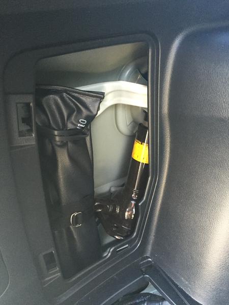 Step 7:  On the left side, remove the jack cover and cover to access the tail light bulbs. On the right side, just remove the access cover to the tail