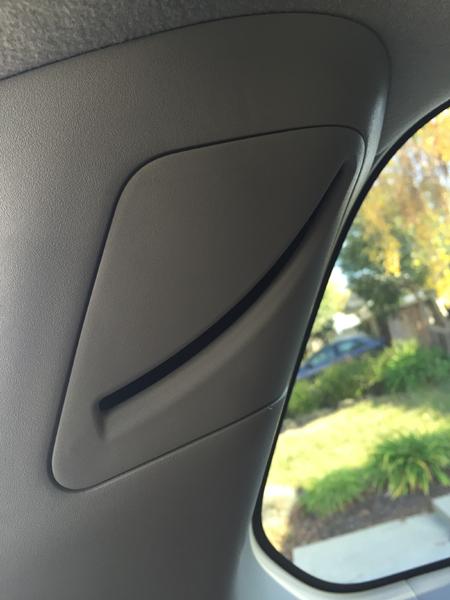 Step 8: Pry off the upper seat belt access cover.