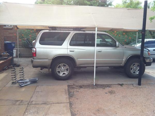 Stock ride height. Looks like the rear is saggy.