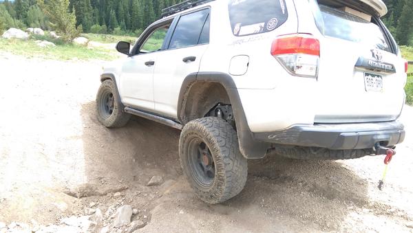 Stretching her legs out
