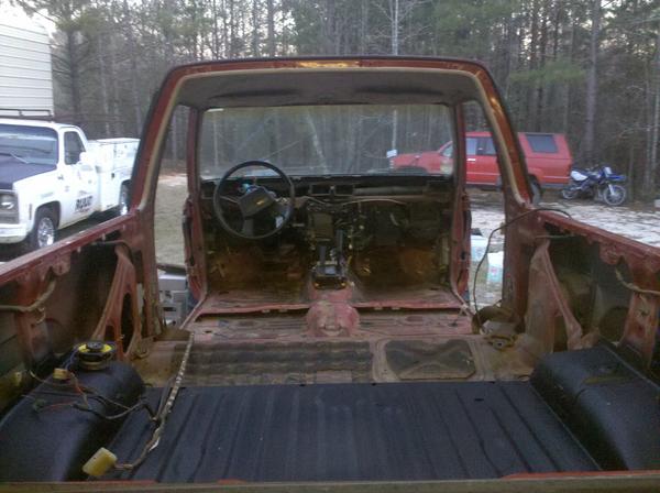 Stripped. New bed liner and wriring harness