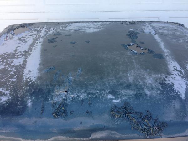 Stripping the paint from the new green hood