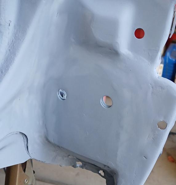 Tailgate pivot mount after.  Still needs a little sanding work.