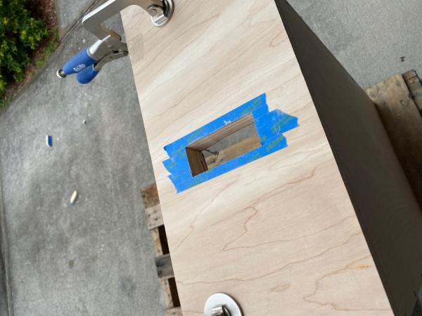 Taped off the drawer front to prevent splintering when cutting. 3/4 blatic on front of 1/2 drawers for strength and depth.