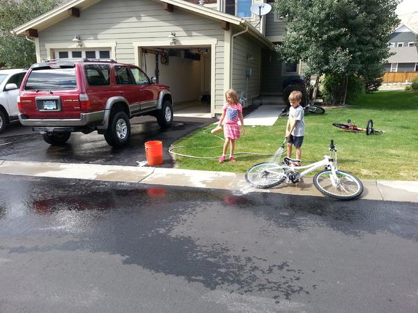 Teaching Ashley and Jack how to clean my truck!