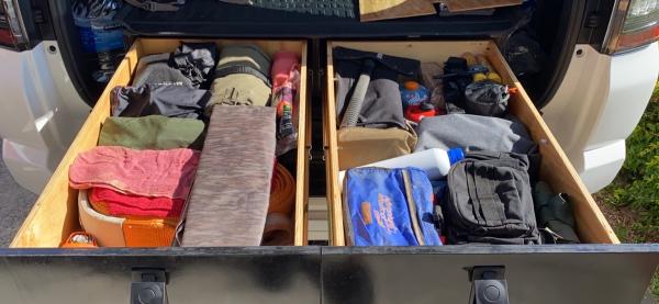Test fit of equipment.  This load out will change once I mount a roof rack and throw a box on top to house recovery gear.  Plenty of room for mechanic