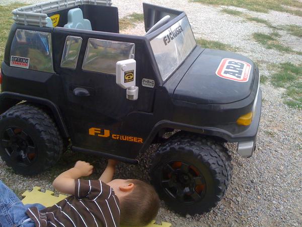 That is my 3yr old changing his transfer case fluid as I was doing my own