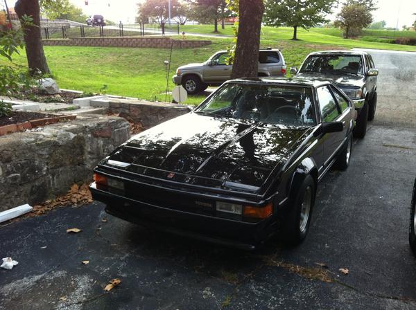 That's my '95 behind it (currently getting new HG's right now, and the wife's 02 sport.