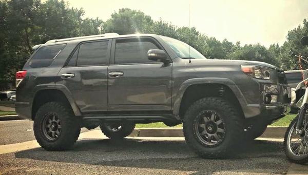 The day she came home all growed up :)

3" Bilstien lift
18" Fuel Offroad Trophy wheels in Anthracite Gray
285/65R/18 Nitto Trail Grapplers
BudBuilt S