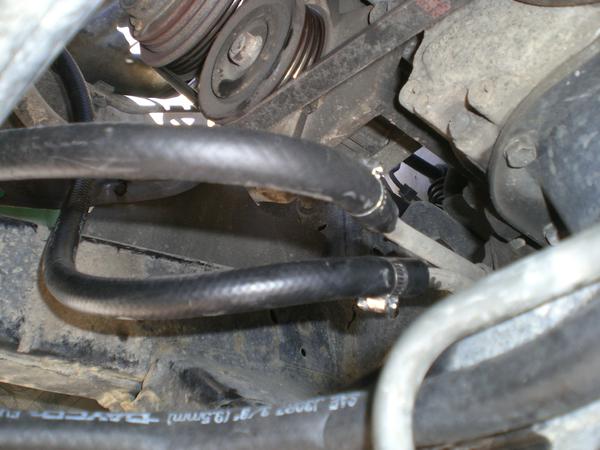 The end result. Hoses mounted properly.