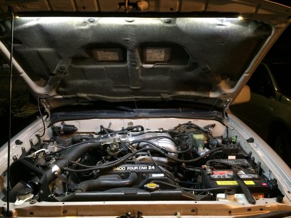 The engine compartment is 100% illuminated in pitch black setting.  Great for emergency roadside needs.