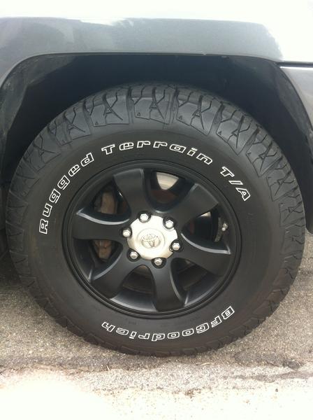 The flat black wheel with Rugged Terrain tires. I'm thinkin about getting that center silver done in flat black too, but it looks sick how it is.