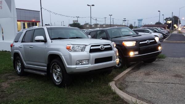the gray one was my first one. I bought that one and traded it on a 2012 tundra.. then I missed the runner so much that i traded the tundra in and got