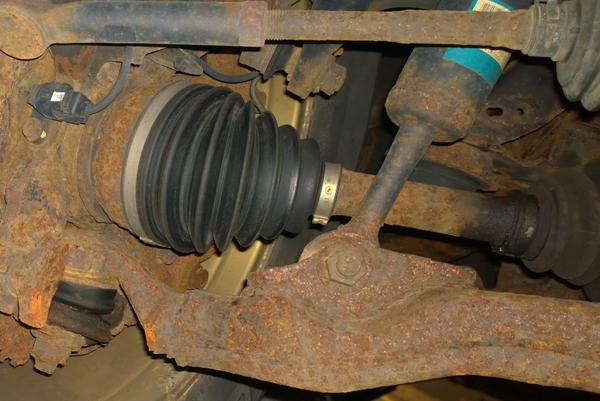 The inward boot was torn right behind the clamp ring.