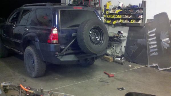 the license plate is now on a bracket with a plate light to keep me legal