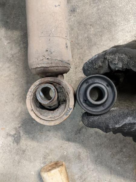The old bushing versus the new bushing. I feel the need to specify that the old one is on the left and the new one is on the right, since the differen