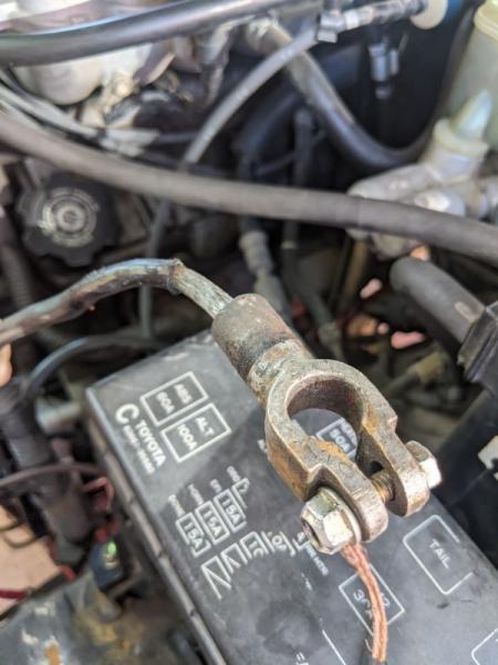 The "original" (not OEM, PO put this on here unfortunately) ground wire. The little tiny wire from the negative terminal to the chassis was also almos
