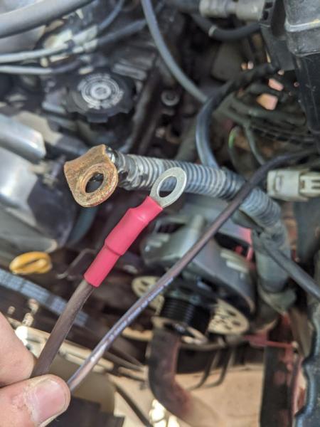 The other two wires that I connected to the positive battery terminal. The larger ring terminal is the original power wire, and the smaller 10-gauge w