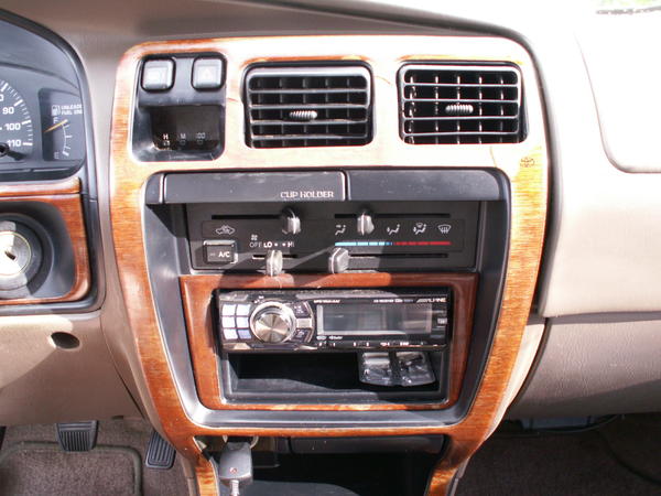 The peeling wood trim...thinking of options to fix...maybe just peel all of the top layer and re-coat the wood?