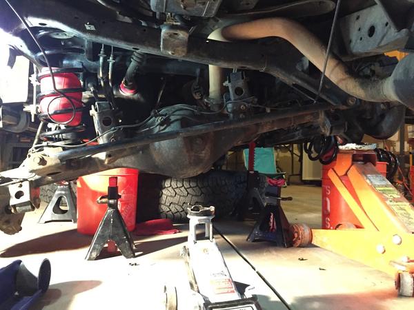 The PITA rear swap. Taller coils, air bags, and no spring compressor made this part of the job very...challenging