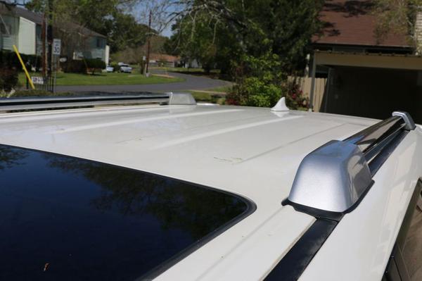 The roof and paint are in excellent condition;  has been kept under cover whole time I've owned it (I bought it new in June 2012).