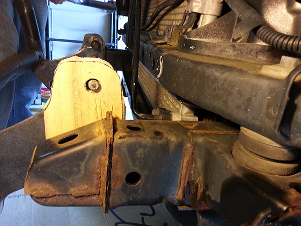 the wood spacer is farther back and has a L bracket supporting it now