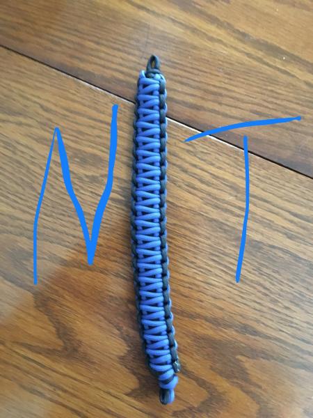 This is a paracord handle I bought from SRQfabrication.