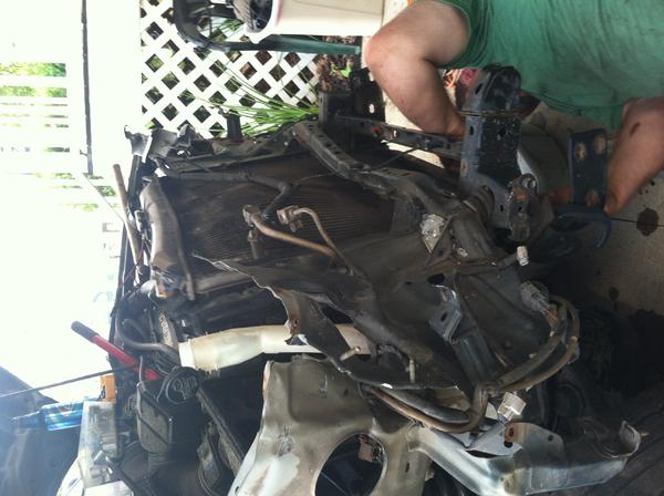 This one shows my dad trying to finish taking bolts out the bottom