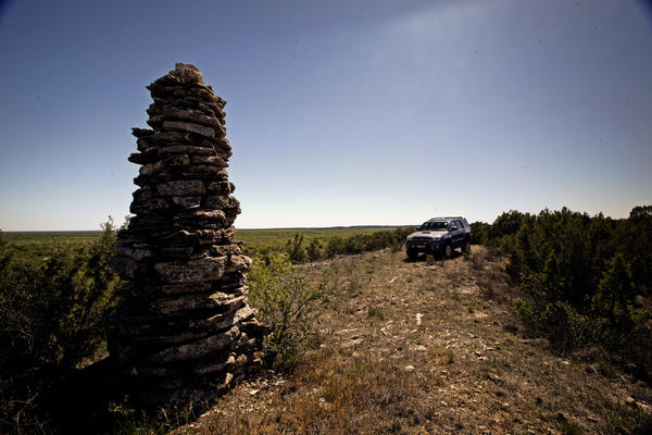 This stack of rocks on private property in West Texas is known as a "water monument." High upon a hill sits this 8-foot tall stack of rocks for the pu