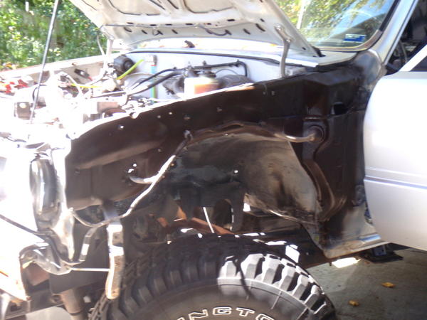 Time to start on the body work. Replaced the fenders with non-rusty ones and undercoated the metal behind it