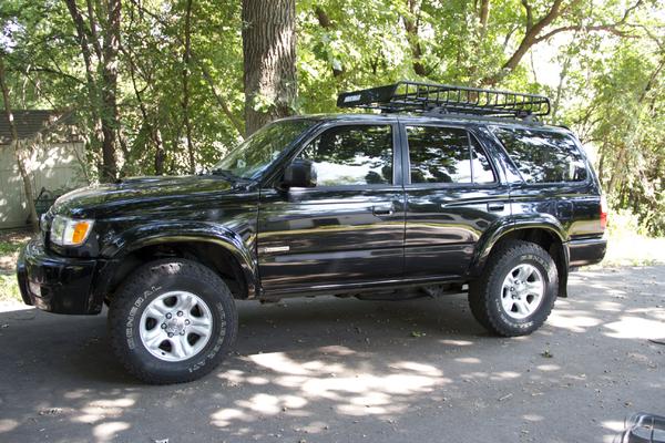 Took off my running boards and added a cargo basket.