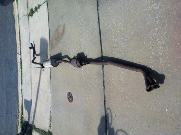 took out the whole exhaust and fixed the giant rust hole where the O2 plug should have been, and found a wasp nest in the old muffler. which had to be