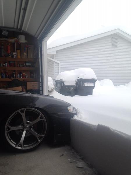 Tried to plow the driveway with 2ft of POW, no dice.