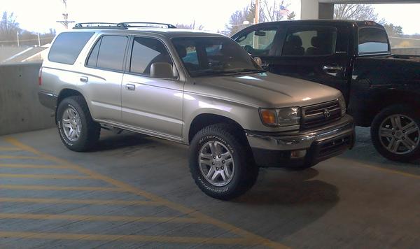 TUNDRA rims, BFG 265/70/17's, painted grille, front tint, NGK wires, Mobil 1, intake reducer off. SR5 flares coming soon.
