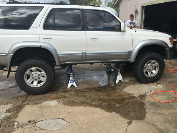 Up on the jacks to install the toyotec ultimate lift.