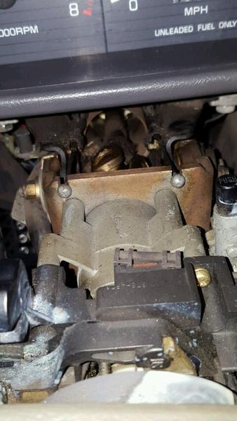 upper steering column between steering wheel and dash