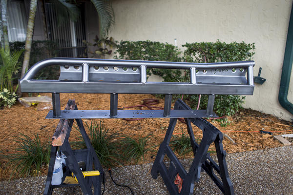 waiting for our color coat to dry after 3 coats of primer, we used Dupli Colors "storm gray metallic" on our new C4 Fab Rock Sliders