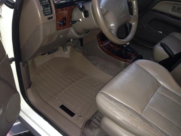 WeatherTech DigitalFit Floor LINERS. (http://www.weathertech.com/mobile/product-education-center/floorliner-digitalfit/). Their all-weather floor mats
