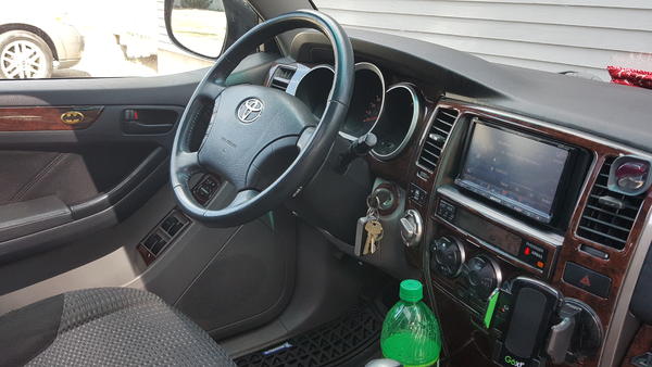 Wheel angle of interior for perception. Retro batman emblems on upper door panel.
