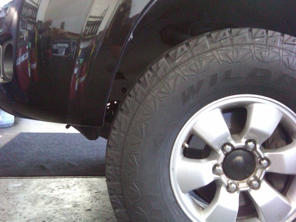 Wheel well fender clearance front left.