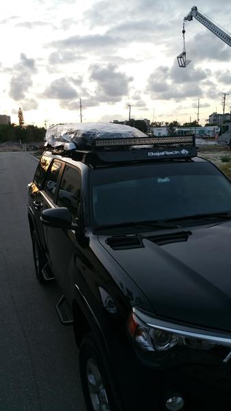 When we got our new Thule

We like the slim ones cuz it allows us to still use the rack for carrying fuel, etc.