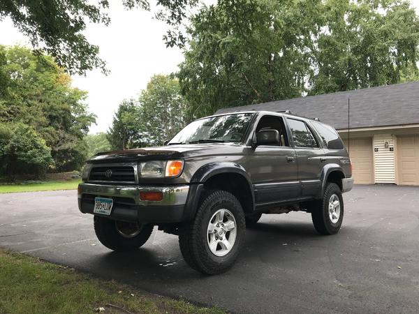 White Bear TWP, MN

Most current version of the truck, out on a Creek sampling run. 3.5" rear lift, 2.85" front, Eimkeith PCK mounts welded in, LT 235