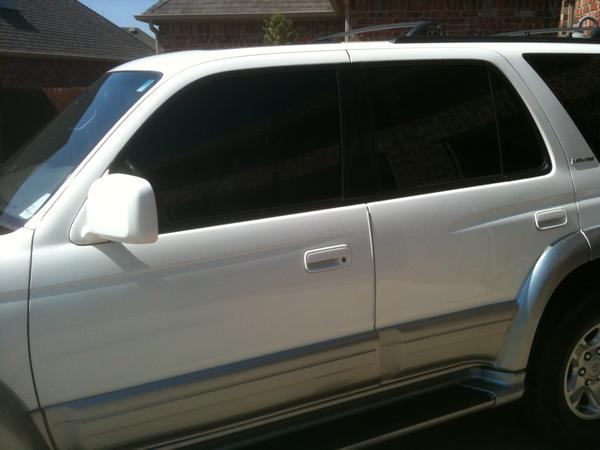 Window tint, July 20th. Added 15% to the front 2 windows for $50 at the best shop ever.