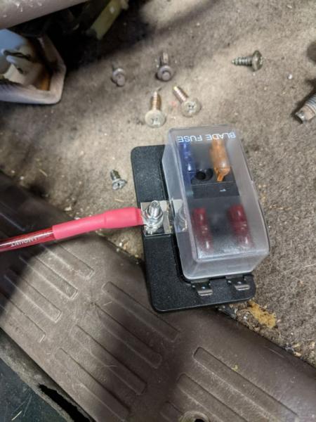 Wired the light bar on top into a cheapo aux box I picked up from Walmart day-of.