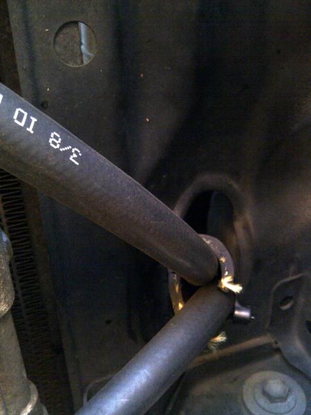 wrapped lines with heater hose to protect them through the hole adjacent the rad