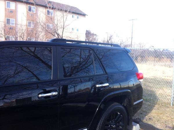 Wrapped the chrome roof rack in carbon fiber