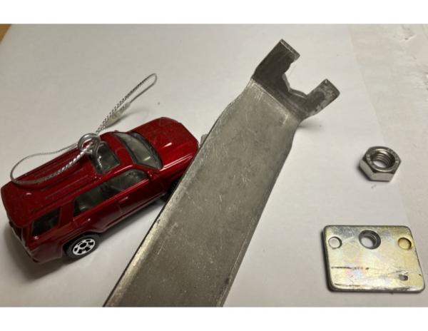 Wrench for combustion exhaust pipe hangar
