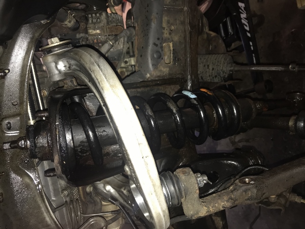 XREAS coilover rust-welded to strut tower, LCA removed