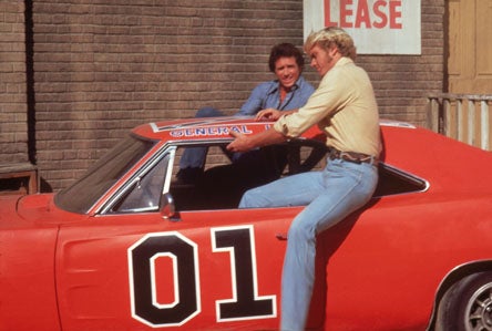 Bo%20and%20Luke%20climbing%20into%20car_1088026017.jpg